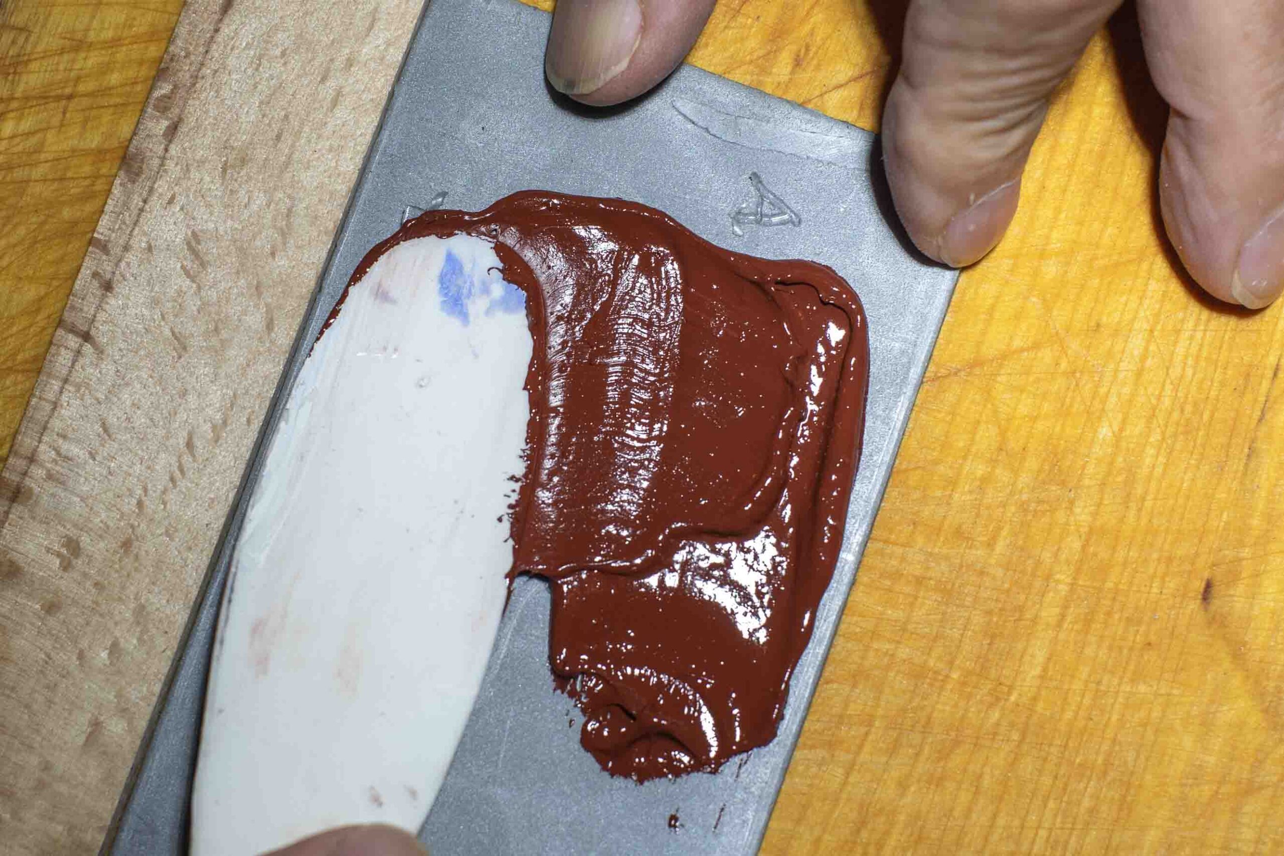 applying mikrosil brown to toolmark comparison wax plate